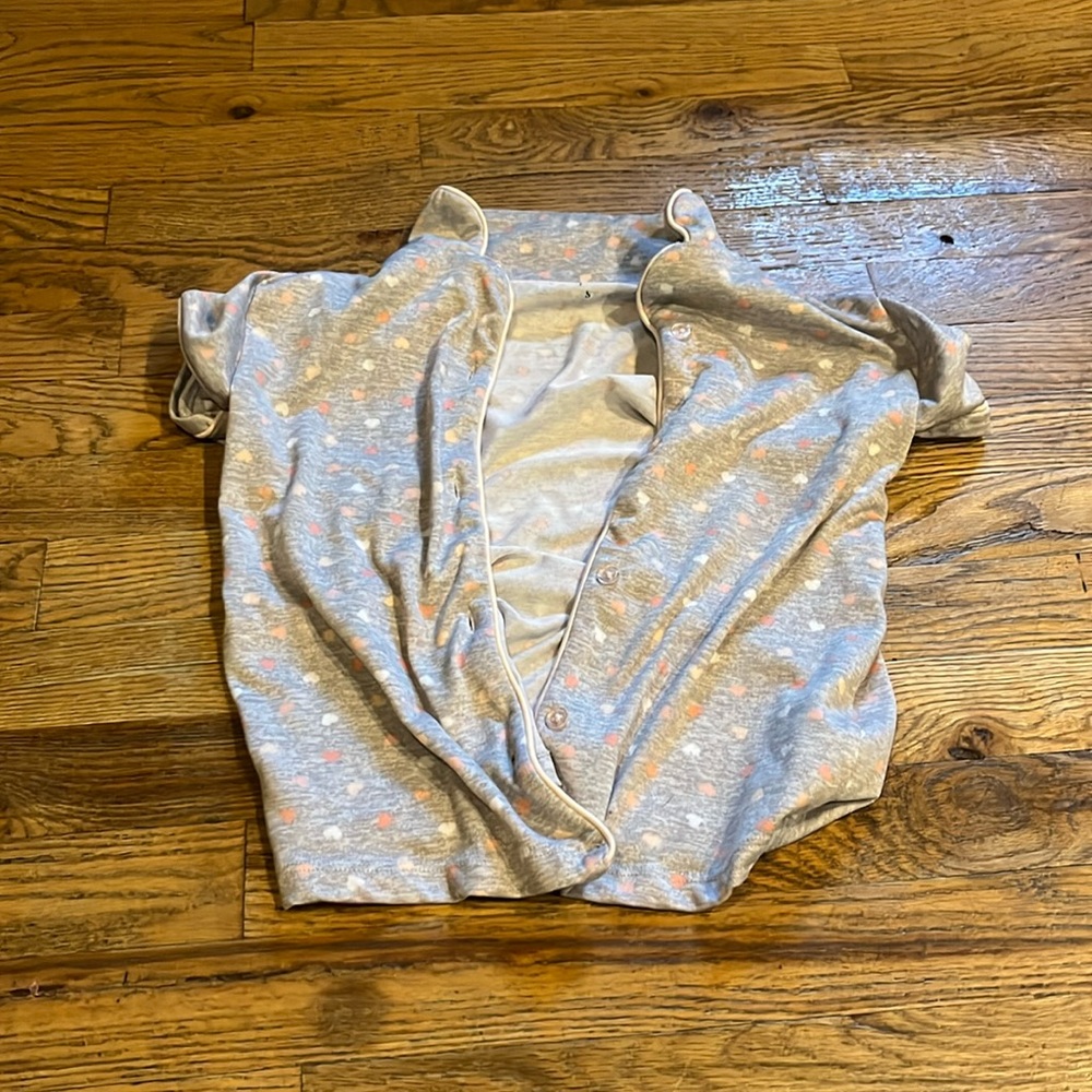 I'm selling a grey and pink button up pj shirt it's by Laura Ashley and is a 7/8